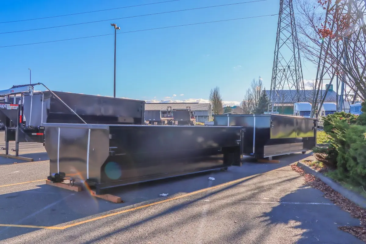 Roll-off dumpster ready for waste disposal at job site for 12 Yard Dumpster Rental in Fort Valley